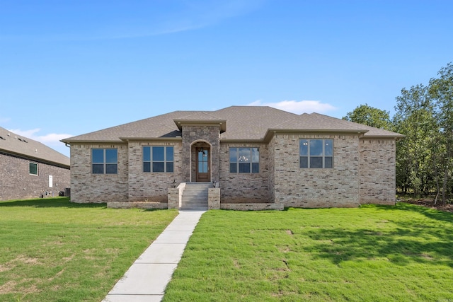 prairie-style house with a front lawn