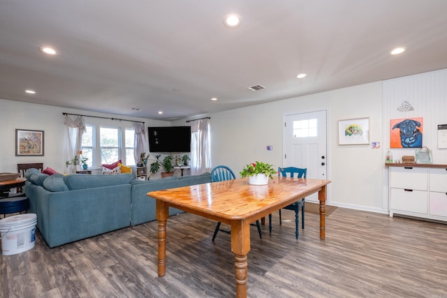 dining area with dark wood-type flooring