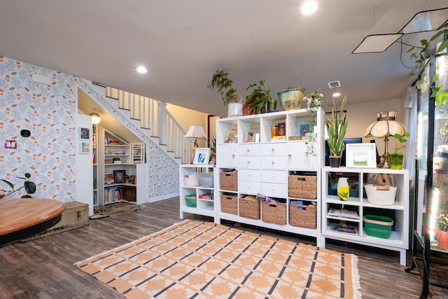 game room with hardwood / wood-style floors