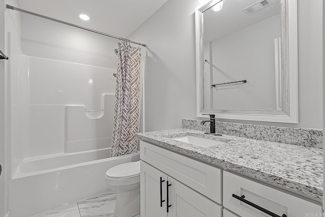 full bathroom featuring shower / bath combination with curtain, vanity, and toilet