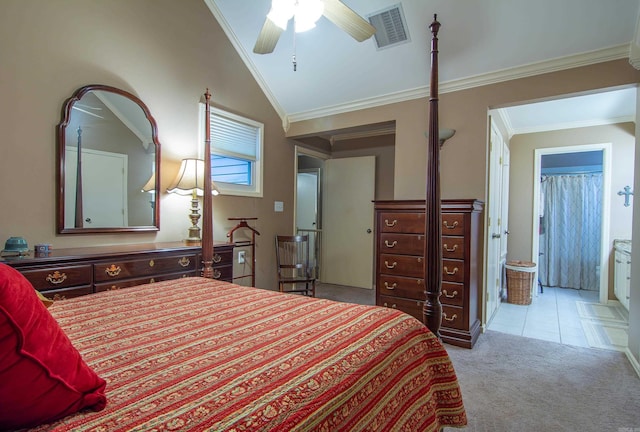 bedroom with connected bathroom, light carpet, ceiling fan, and ornamental molding