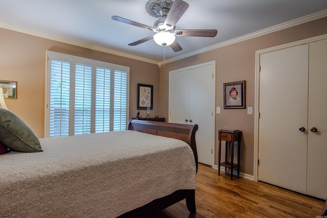 bedroom with wood-type flooring, ceiling fan, and crown molding