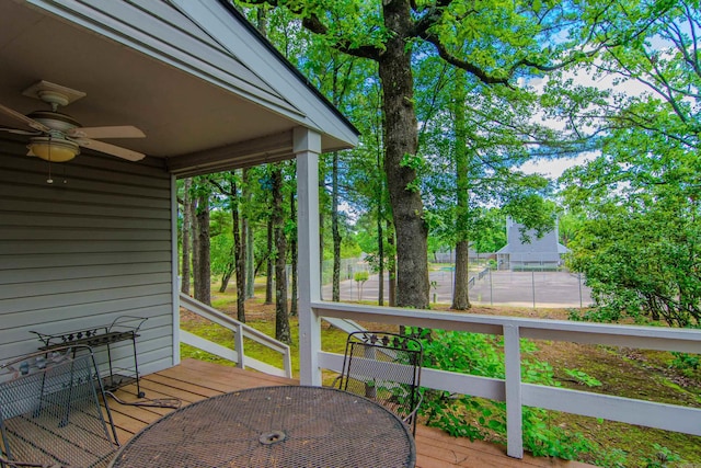 wooden deck with ceiling fan