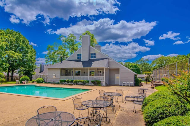 view of pool with a patio area