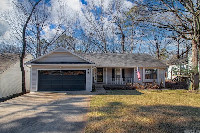 single story home featuring covered porch, a garage, and a front lawn