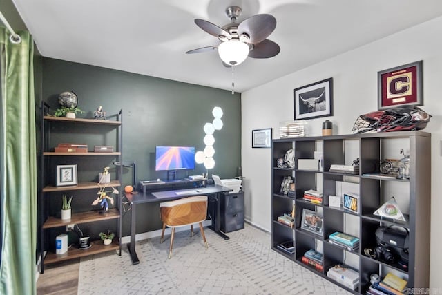 office area with hardwood / wood-style floors and ceiling fan