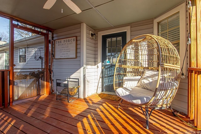 wooden deck with ceiling fan