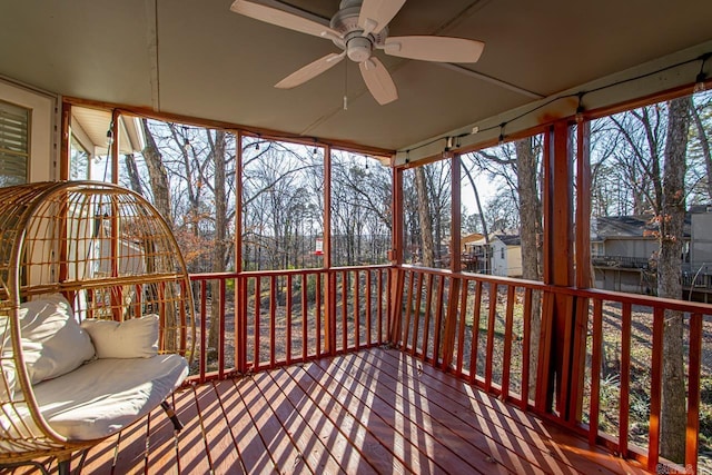 wooden deck with ceiling fan