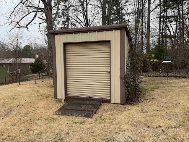 view of outdoor structure with a lawn