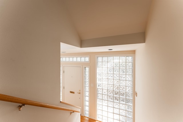 entrance foyer with vaulted ceiling