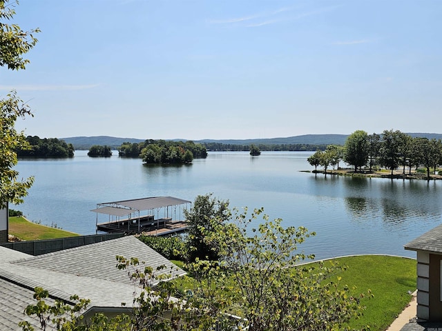 exterior space with a water view