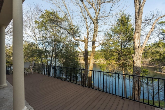 wooden terrace with a water view