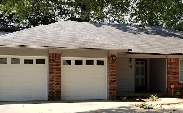 ranch-style home with a garage