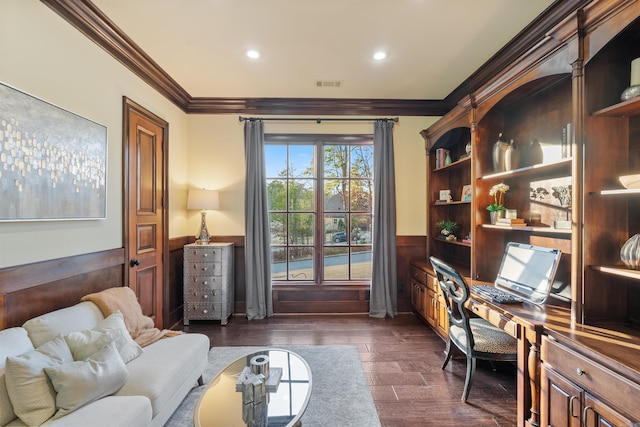 office space featuring wooden walls, dark hardwood / wood-style floors, and crown molding