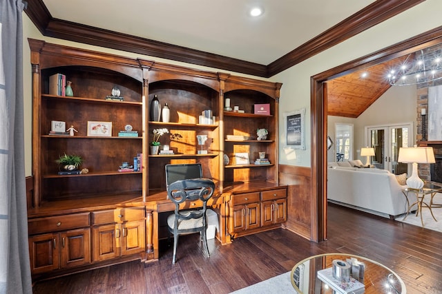 office area with french doors, ornamental molding, dark wood-type flooring, built in desk, and lofted ceiling