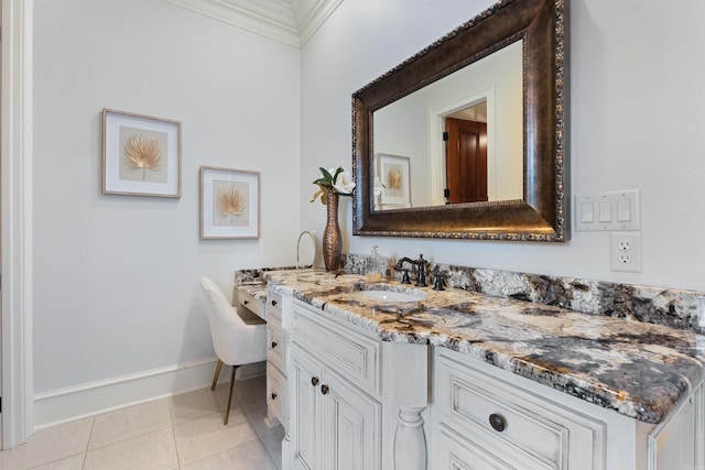 bathroom with tile patterned flooring, vanity, and crown molding