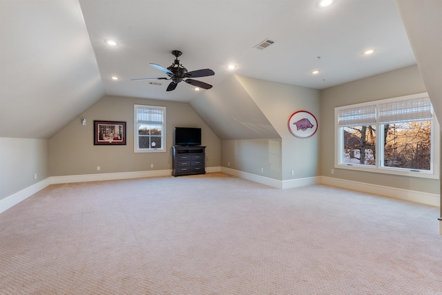 bonus room with light colored carpet, ceiling fan, and lofted ceiling