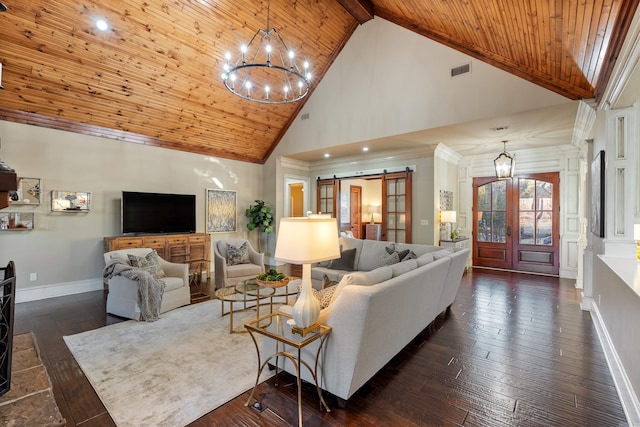 living room featuring high vaulted ceiling, french doors, dark hardwood / wood-style floors, a barn door, and beamed ceiling