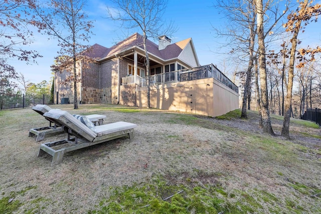 rear view of property with a balcony