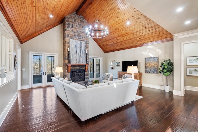 living room featuring dark hardwood / wood-style floors, wood ceiling, a fireplace, and french doors