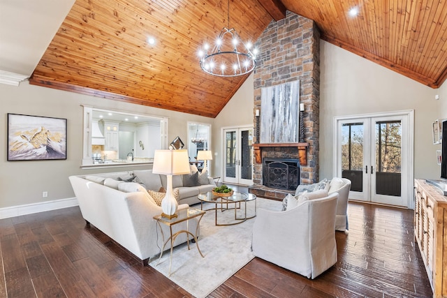 living room with dark hardwood / wood-style floors, a fireplace, high vaulted ceiling, and french doors