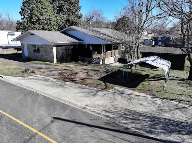 view of home's exterior featuring a carport