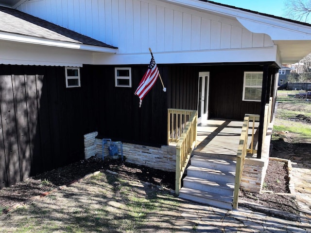 property entrance with covered porch