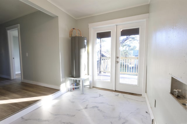 doorway with french doors, a wealth of natural light, ornamental molding, and water heater