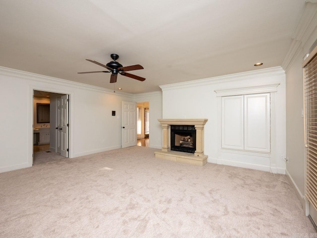 unfurnished living room featuring ceiling fan, crown molding, and light carpet