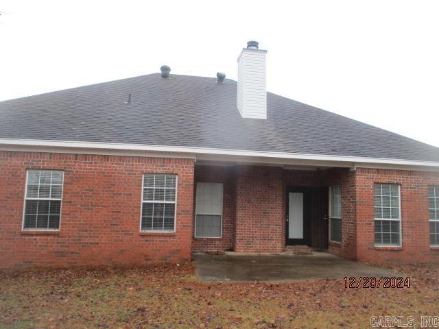 back of house featuring a patio