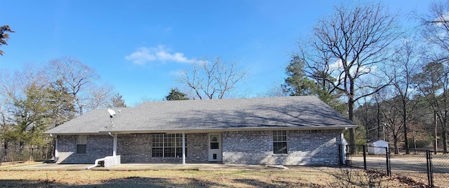 back of property featuring a patio