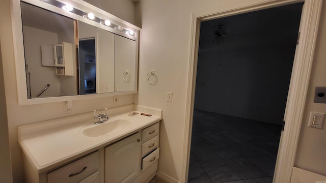 bathroom featuring tile patterned floors and vanity