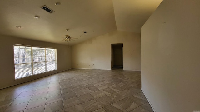 unfurnished room featuring ceiling fan and lofted ceiling