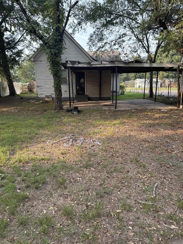 view of yard with a carport