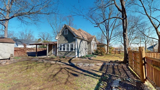 view of home's exterior with a yard