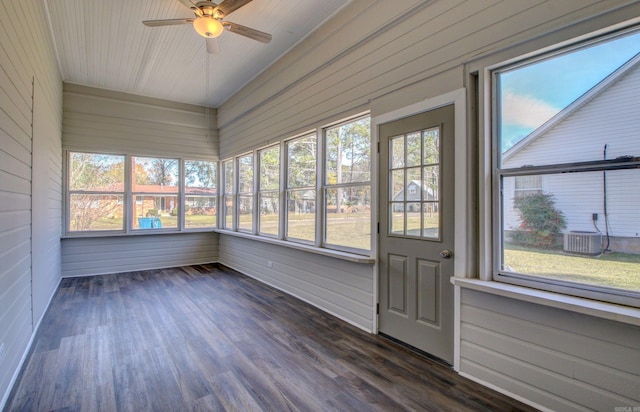 unfurnished sunroom with ceiling fan