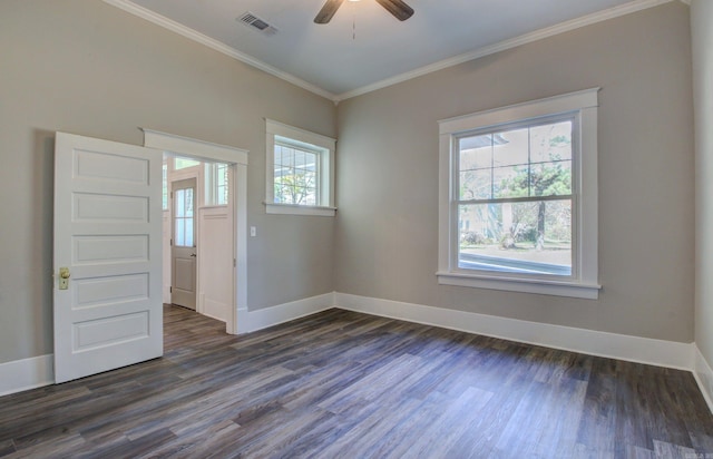 unfurnished room featuring ornamental molding, a wealth of natural light, dark wood-type flooring, and ceiling fan