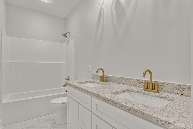 full bathroom featuring shower / tub combination, vanity, and toilet