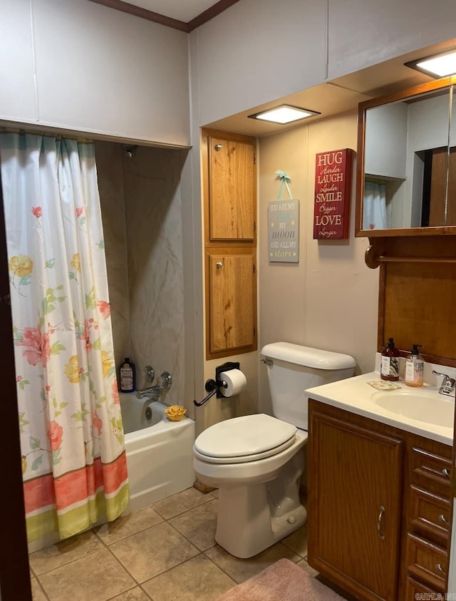 full bathroom with tile patterned flooring, vanity, toilet, and shower / bath combo with shower curtain