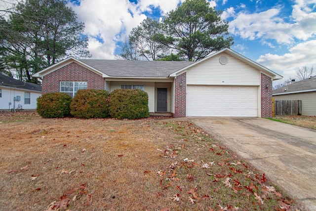 single story home featuring a garage