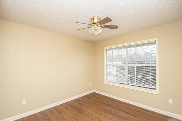 unfurnished room with hardwood / wood-style floors, ceiling fan, and a textured ceiling