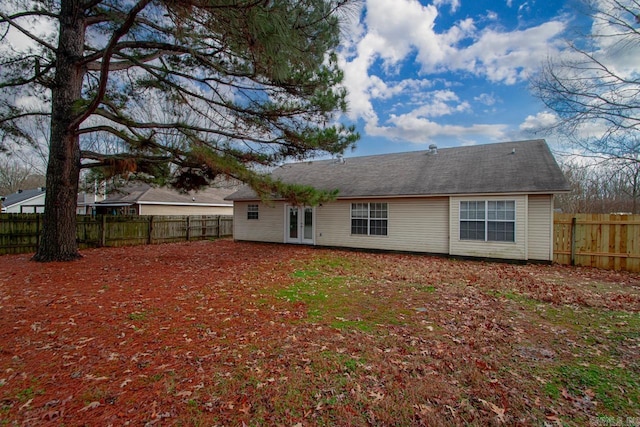 back of house featuring french doors