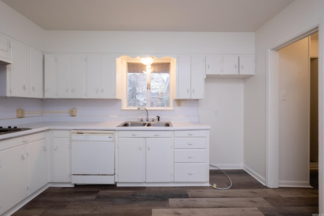 kitchen featuring white appliances, dark hardwood / wood-style floors, white cabinetry, and sink