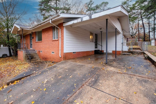 view of front of house featuring a carport