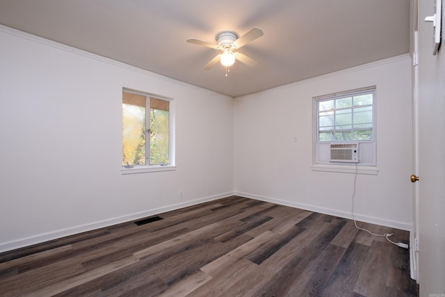 unfurnished room featuring ceiling fan, dark hardwood / wood-style flooring, cooling unit, and ornamental molding