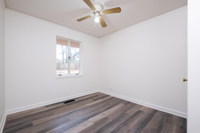 empty room with dark hardwood / wood-style floors, ceiling fan, and crown molding