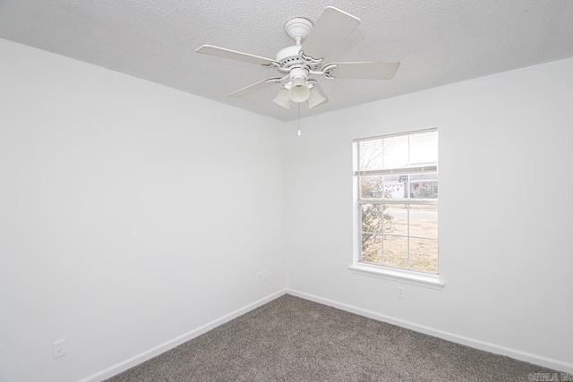 unfurnished room featuring carpet, ceiling fan, and a textured ceiling