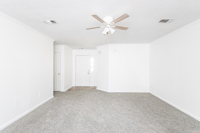 unfurnished room with light carpet, a textured ceiling, ceiling fan, and crown molding