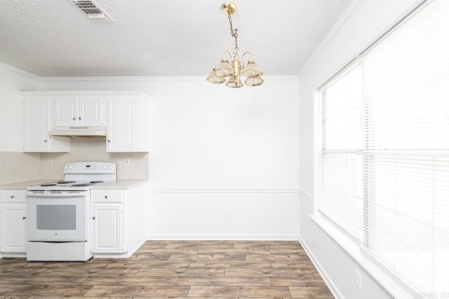 kitchen featuring white cabinetry, white range with electric stovetop, hanging light fixtures, and ornamental molding