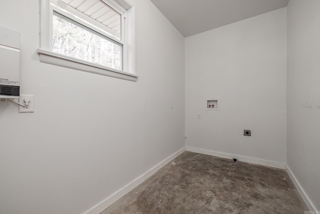 clothes washing area with hookup for an electric dryer and hookup for a washing machine